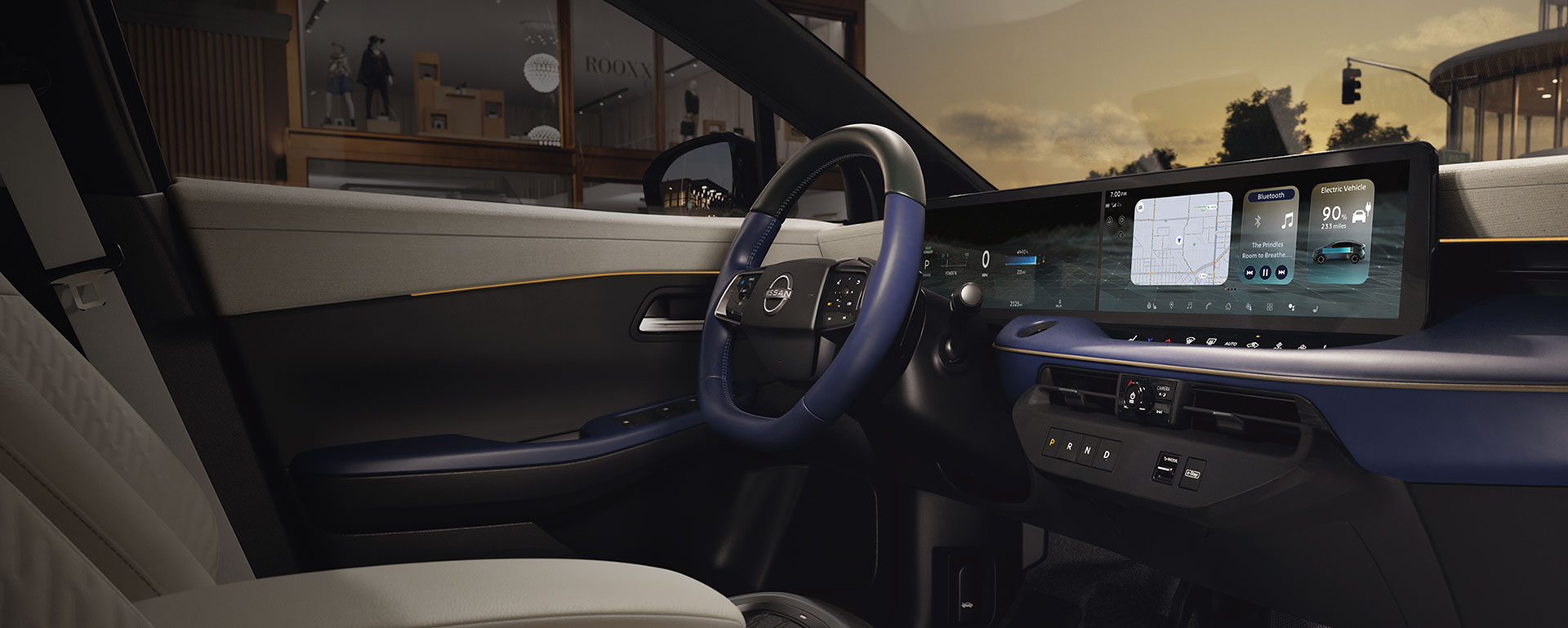 The interior of a car features a blue steering wheel, large display screens, and a grey center console.